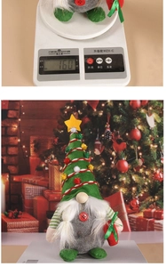 Detailed view of a Christmas gnome doll on a scale showing 160g weight and holiday decor