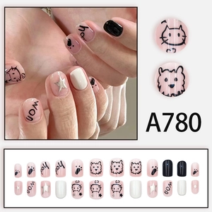 Pink cartoon press-on nails set featuring cute hand-painted cats and paw prints