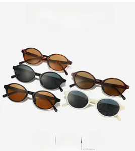 Detailed collection of oval sunglasses in leopard, black, brown, and cream frames