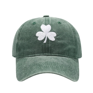 Vintage dark green washed cotton baseball cap featuring white shamrock embroidery
