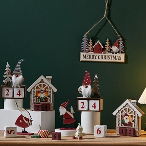 Vintage wooden Santa Claus countdown calendar and festive gnome table decor set