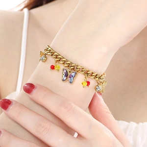 Golden butterfly pendant chain bracelet with purple gradient wings and colorful beads