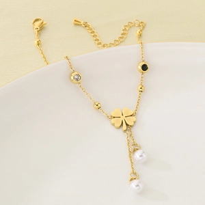 Double-layer stainless steel clover anklet with pearls and zircon in golden finish
