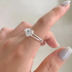 Irregular textured S925 silver open ring with a large heart-shaped cubic zirconia stone