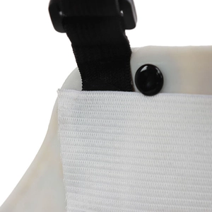 Macro detail of white skeletal mask showing durable strap buckles and reinforced stitching