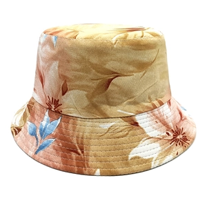Detail of warm floral print bucket hat with orange flowers and reinforced brim stitching