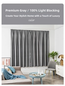 Detail showing 100% blackout gray fabric texture with a premium smooth glossy finish