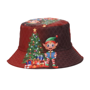 Detail of red Christmas bucket hat featuring festive elf and holiday tree prints