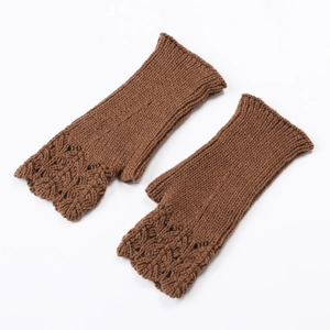 Close-up of brown knit fingerless gloves with detailed fish scale pattern and scalloped edges