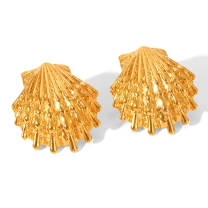 Detailed close-up of 18k gold-plated starfish shell earrings with textured 3D details