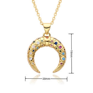 Detail shot of a gold crescent moon pendant showing precise dimensions 19mm by 20mm