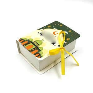 Detail of Eid Mubarak star moon castle book box with ribbon and mosque pattern