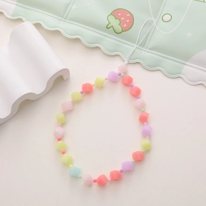 Detail of colorful frosted cube beads in macaron colors for handmade phone charm