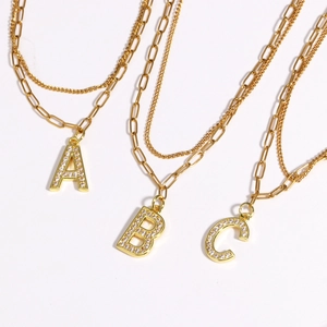 Double-layered gold letter necklace with A B C pendants and zircon crystals