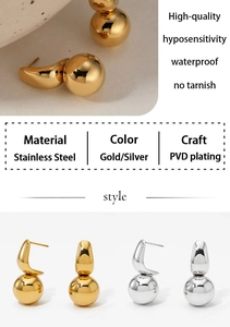 Macro detail of PVD plated stainless steel ball earrings in gold and silver finish