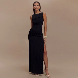 Elegant black sleeveless backless maxi dress with pleated texture and side split detail