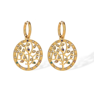 Close-up of gold-plated tree of life earrings with colorful zircon crystals and circular hoops