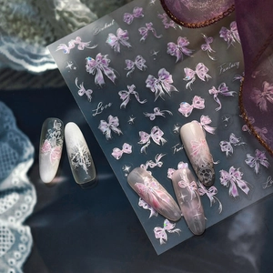3D embossed ribbon and butterfly nail art stickers with purple gradient and star accents