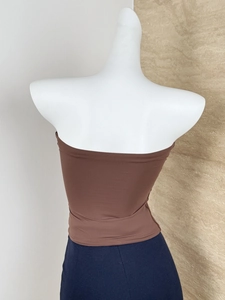 Back view of a high-elastic brown tube top with skin-friendly texture on a mannequin