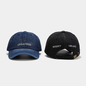 Classic washed denim baseball caps in blue and black with Greatness embroidery