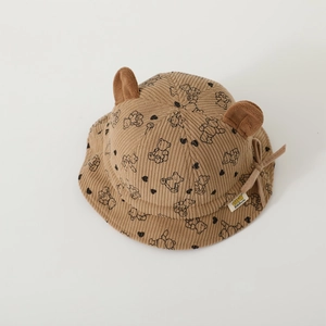 Detail of baby corduroy bucket hat with 3D bear ears and small bear print pattern