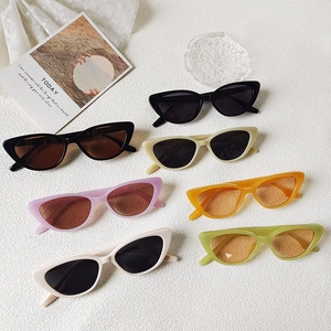 Retro cat-eye sunglasses set in various colors on a white minimalist aesthetic background