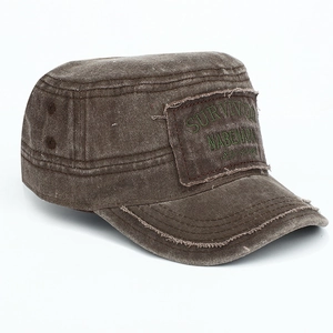 Detailed view of vintage washed cotton military cap with embroidered survivor patch logo