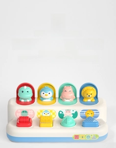 Detail showing colorful flip lids with cartoon animals and interactive control buttons
