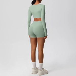 Close-up back view of high-waist sage green yoga shorts with shaping and lifting effect