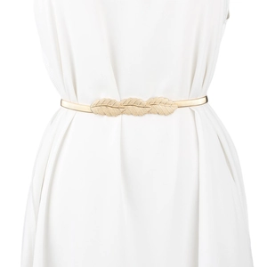 Elegant gold metal leaf elastic waist belt shown on a white dress for fashion styling