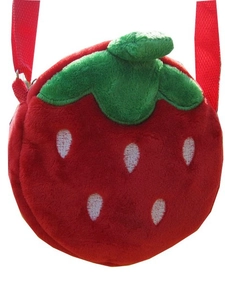 Plush strawberry crossbody bag for children featuring red fabric and green leaf detail