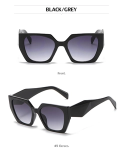 Front and side view of cat eye sunglasses with black frames and grey gradient lenses