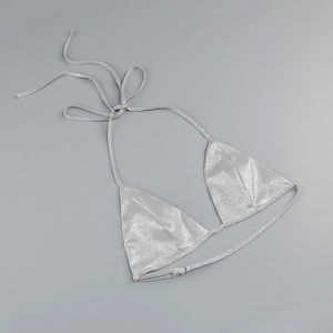 Detail of silver sequined triangle bikini top with adjustable ties and metallic texture
