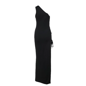 Detail of black one-shoulder dress showing ribbed knit texture and side drawstring ties