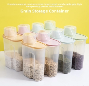 Detail of transparent grain storage jars with graduated pouring lids and side grip handles