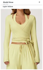 Light yellow sports set featuring V-neck wrap top and drawstring pants on model