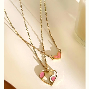 Chic gold-plated heart pendant necklaces with vibrant pink enamel and white shell inlay