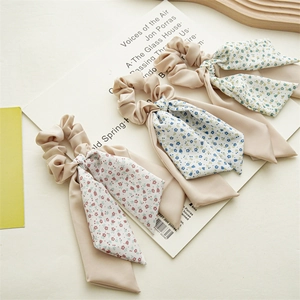 Floral print scrunchie set with long ribbon bows in pink and blue chiffon fabric
