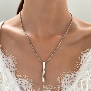 Minimalist silver twisted vertical bar pendant necklace on stainless steel chain for women
