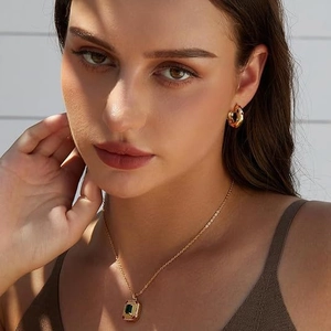 French vintage gold hoop earrings and emerald green necklace set for women with retro flair