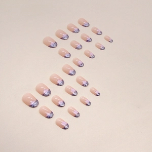 Sparkly French star press-on nails in oval shape with silver glitter and nude base