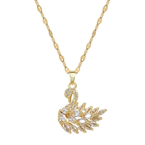 Gold titanium swan necklace featuring brilliant marquise and round cut crystals