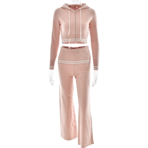 Detail of pink knitted two-piece set with white stripes on hooded zipper jacket and pants