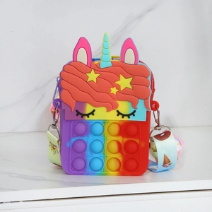 Close-up of a colorful unicorn pop-it fidget bag with patterned silicone shoulder strap