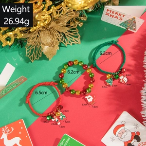 Colorful beaded Christmas bracelet set with Santa Claus and tree charms on red green ropes
