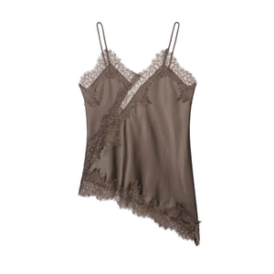 Detail of taupe satin camisole showing asymmetric lace trim and delicate fabric texture