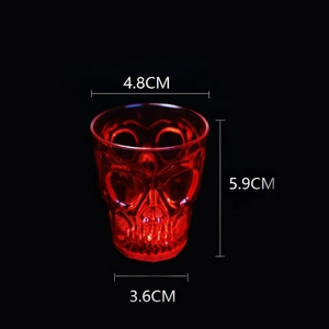 Detailed view of red LED skull cup with 4.8cm diameter and 5.9cm height dimensions