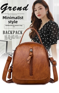 Brown faux leather backpack featuring vintage texture with fringe tassels and vertical zippers