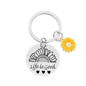 Detail of stainless steel keychain with sunflower charm and Life is Good engraving