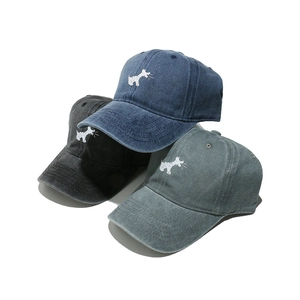 Washed cotton baseball caps in navy, charcoal, and olive with embroidered dog logo